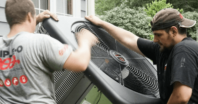 HVAC Technician Installing Air Conditioning Unit Rochester, NY HVAC Technician Installing Air Conditioning Unit Rochester, NY